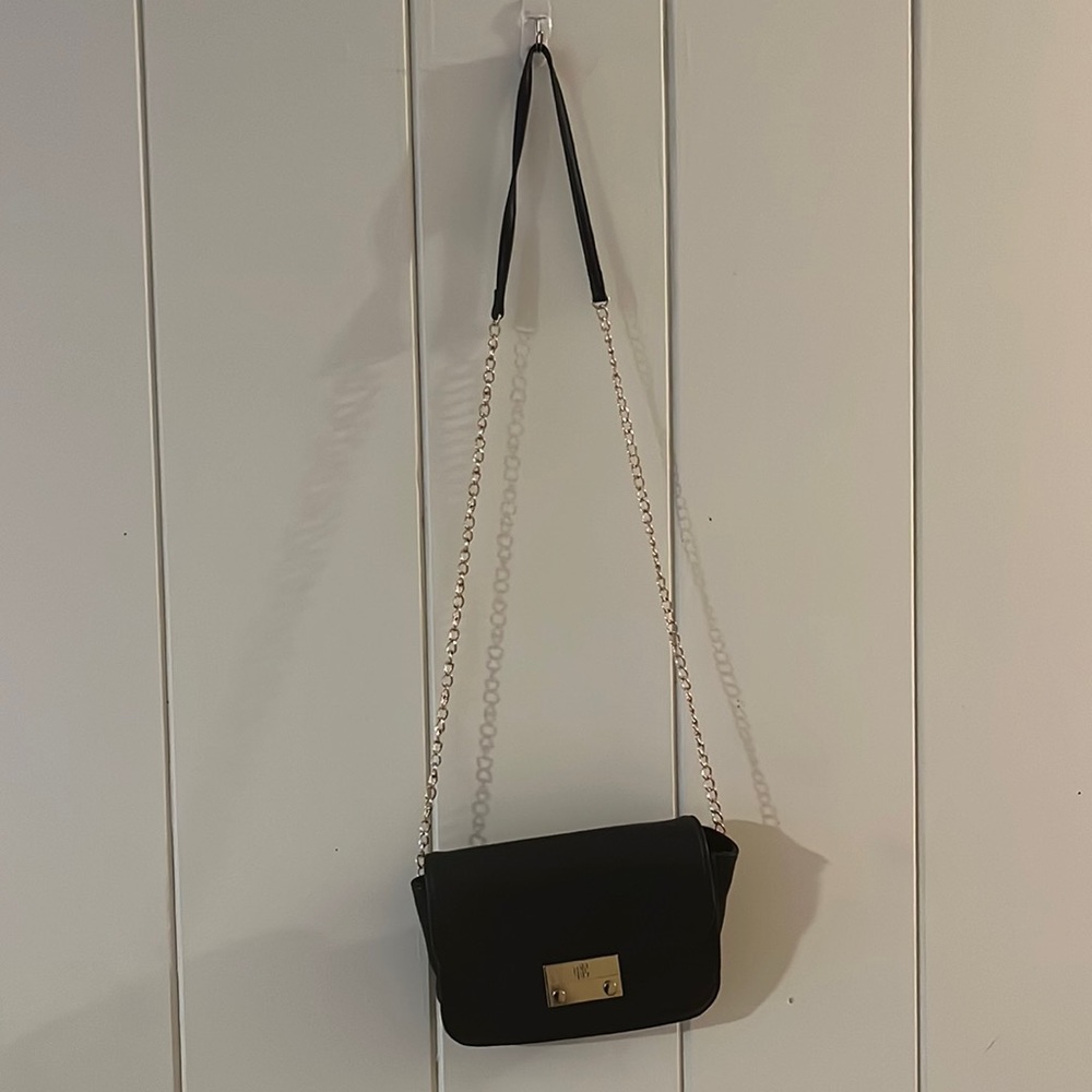 I.N.C. Black crossbody with gold chain accent
